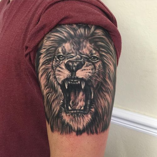Realistic Excellent Roaring Lion Tattoo On Half Sleeve
