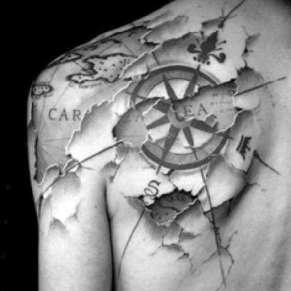 Ripped Skin Compass & World Map Tattoo on Chest & Shoulder