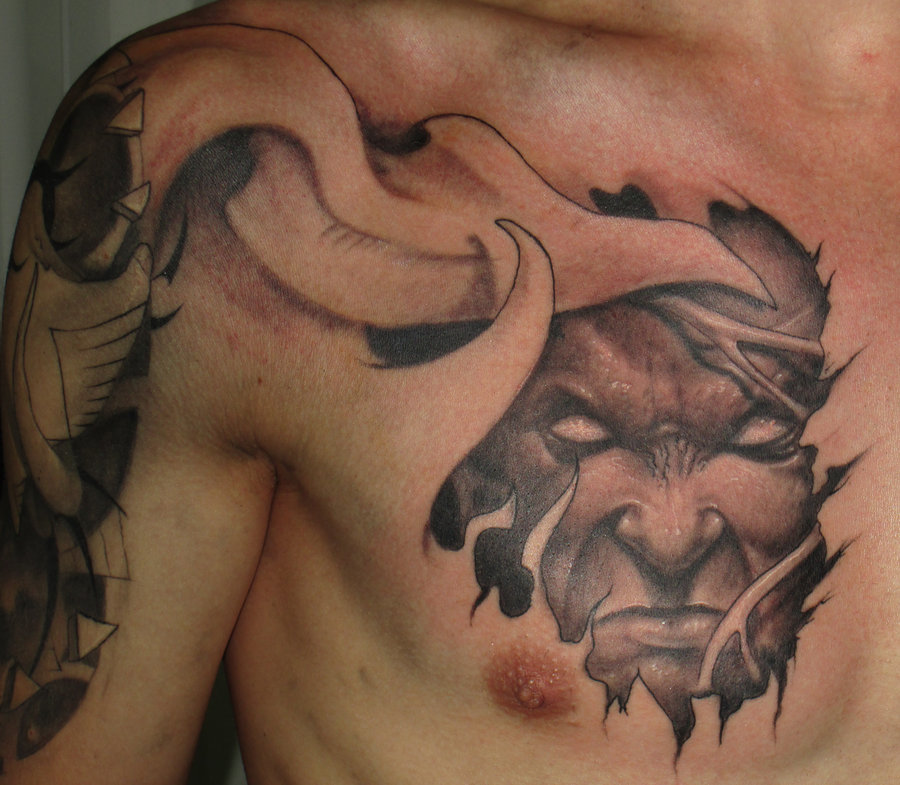 Ripped Skin Demon Tattoo On Chest Representing Inner Demon