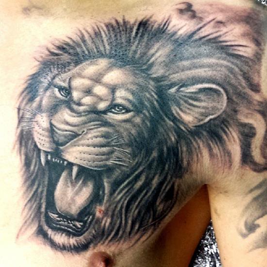 Roaring Lion Head Tattoo On Chest