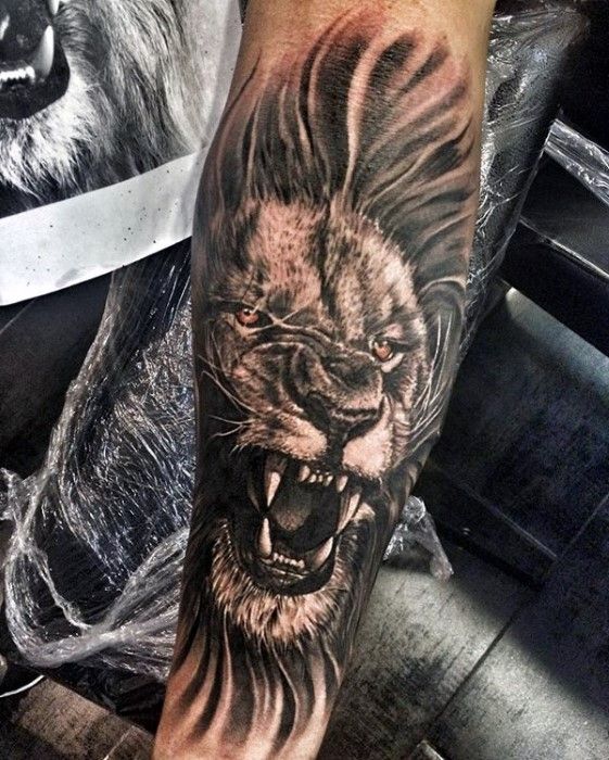 Roaring Lion Tattoo On Forearm