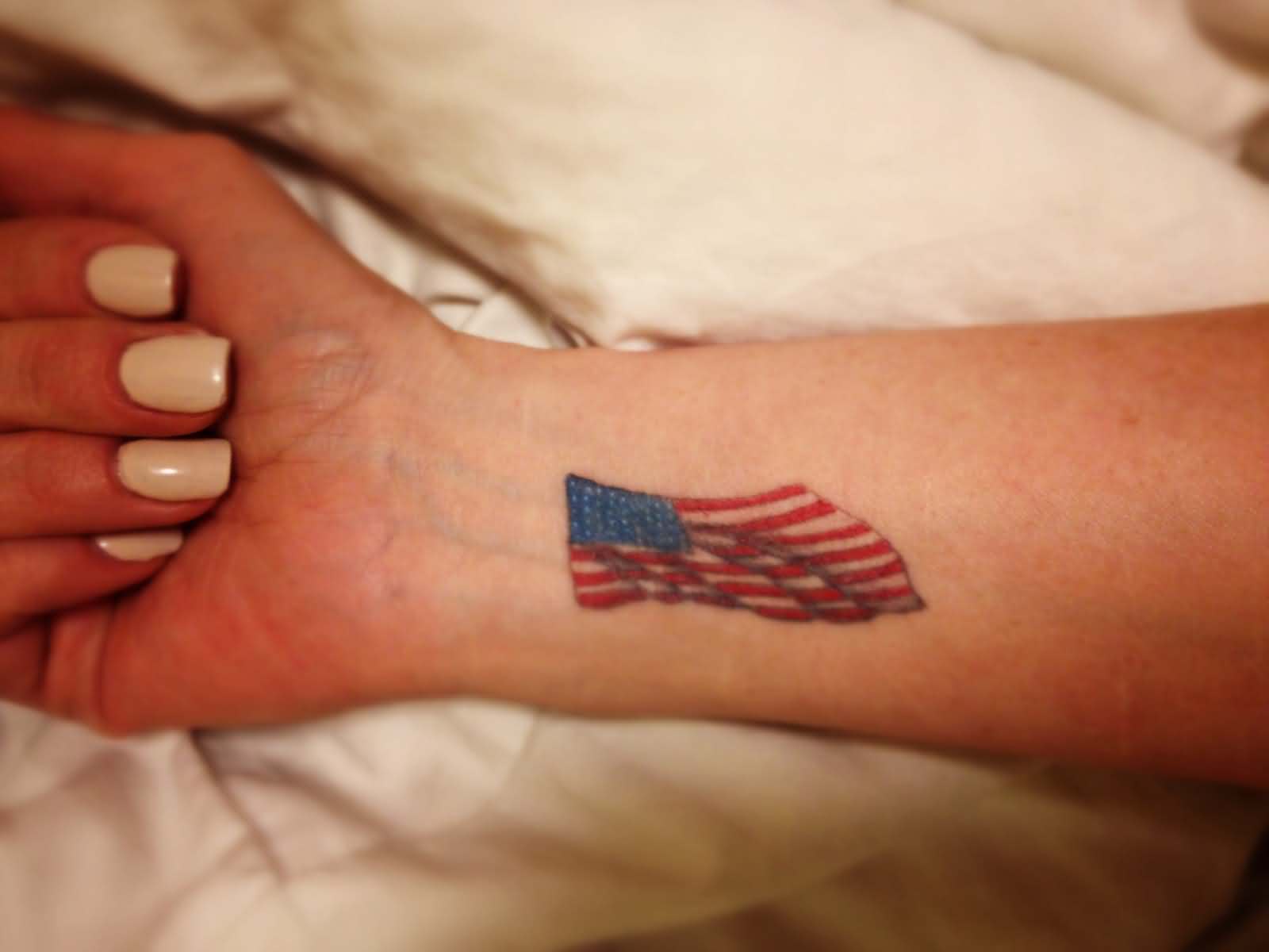 Small American Flag Tattoo On Wrist