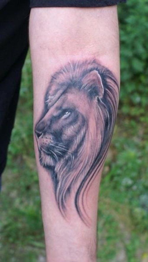 Small Lion Face Tattoo On Forearm