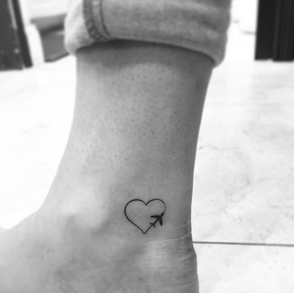 Tiny Airplane With Heart Tattoo on Ankle – Perfect Travel Love Tattoo