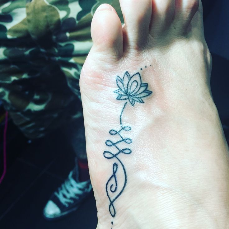 Unalome Lotus Flower tattoo On foot