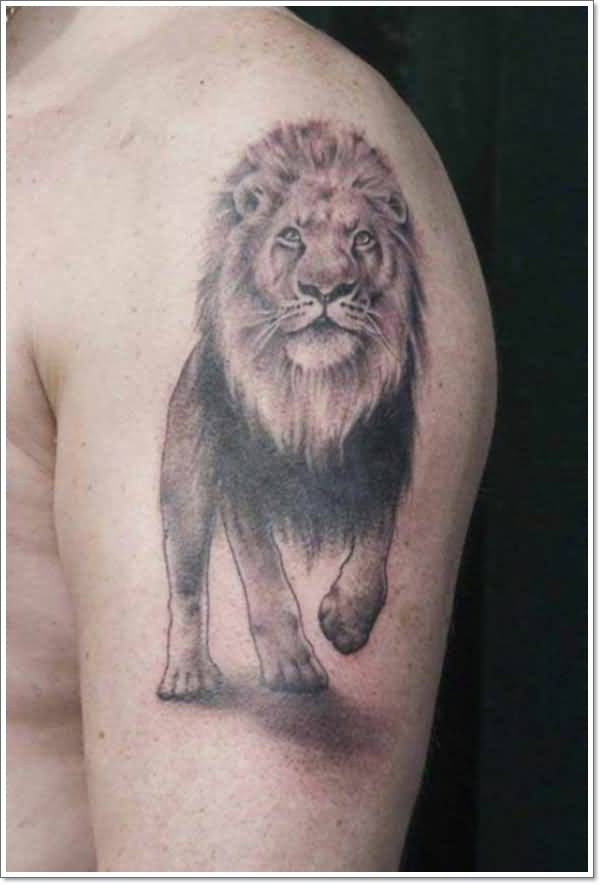 Walking Lion Tattoo on bicep