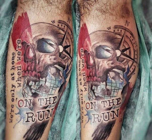 We’re only at Home When We’re On The Run Text With Skull & Compass Travel Tattoo