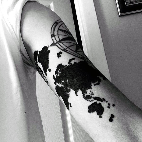 World Map With Compass Tattoo In Black Color On Bicep