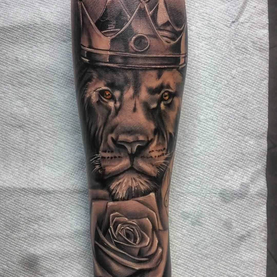 king Lion With crown and Rose Tattoo On Sleeve