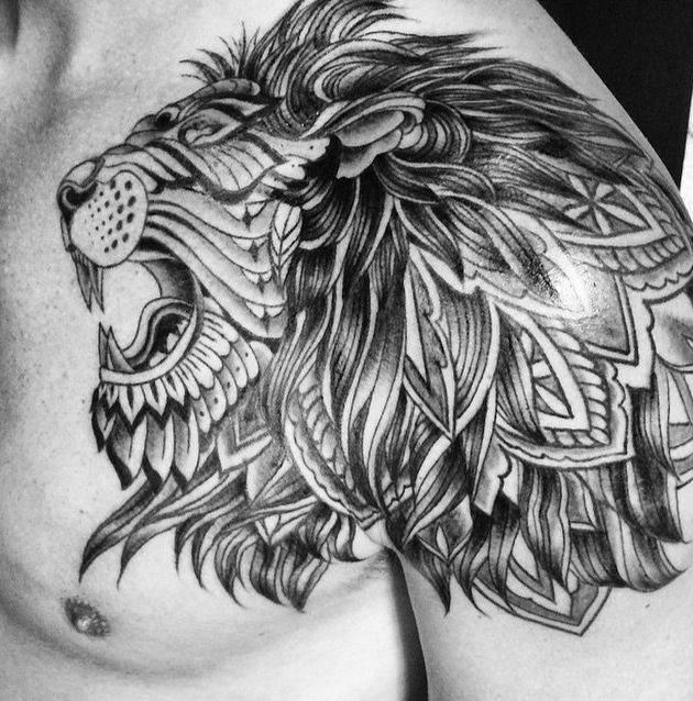 tribal grey Ink Lion Tattoo On Chest And upper Arm