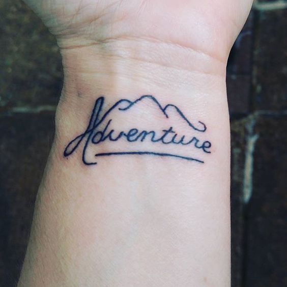 Amazing Mountain Adventure Wrist Travel Tattoo Idea For Couples