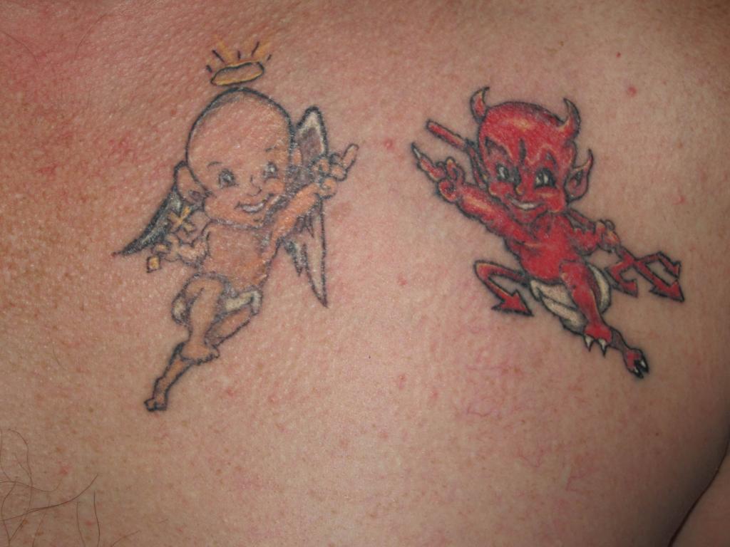 Cute Baby Angel Baby Devil Tattoo On Back Shoulder.