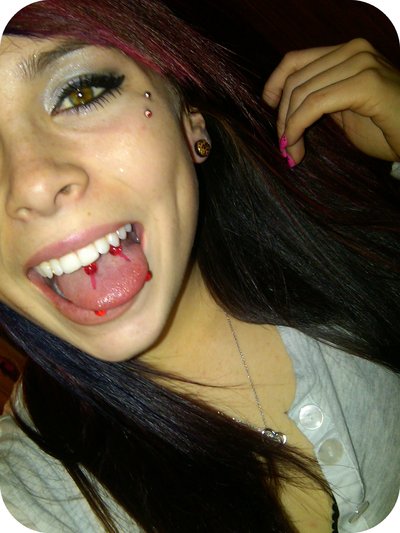 Girl With Tongue and Butterfly Kiss Anti Eyebrow Piercing