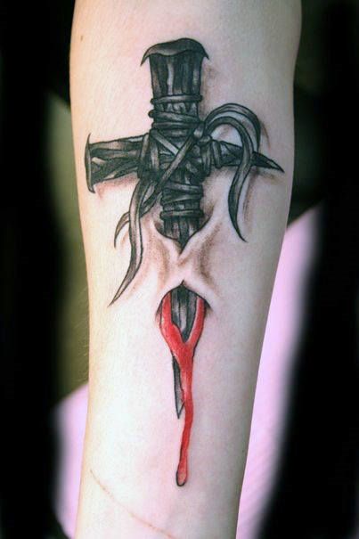 Ripped Skin Dagger Cross Tattoo On Forearm