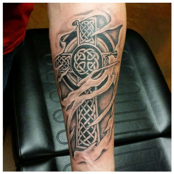Ripping Skin Celtic Cross Tattoo On Forearm