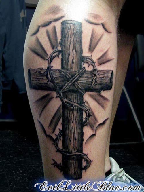 Wooden Cross With Barbed Wire Tattoo on Forearm