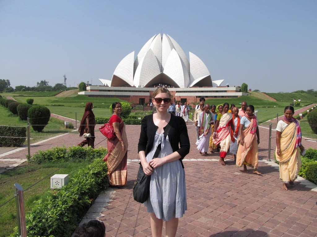 A tourist Posing For Photograph At the Lotus Temple