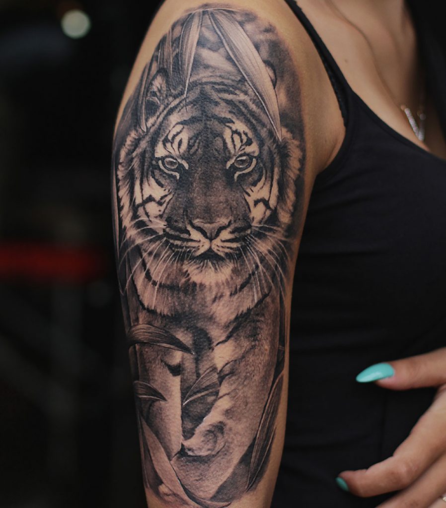 Beautiful Dark Grey Tiger Tattoo On Arm For Girls Done By Angelique Grimm