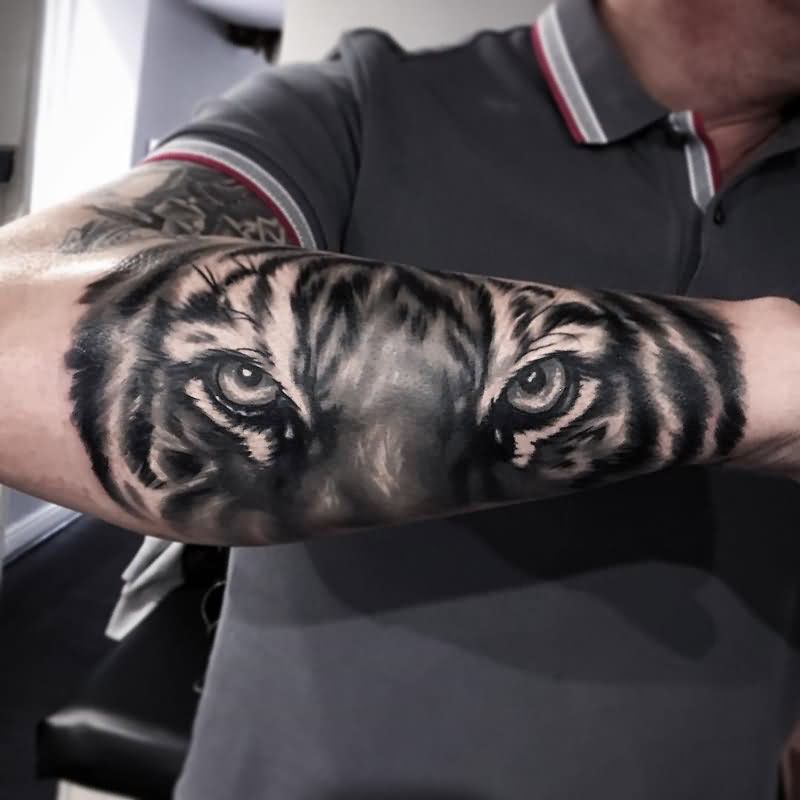 Beautiful Wild Tiger Eyes Tattoo On Forearm