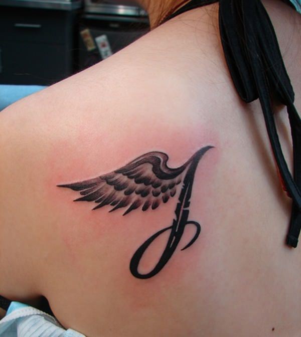 Black & Grey Letter ‘J’ With Angel Wing Memorial Tattoo On Girl Back