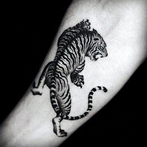 Black & Grey Small Roaring Lion Tattoo On Wrist