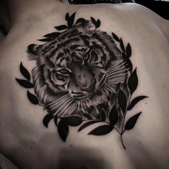 Black & Grey Tiger Head With Leaves Tattoo On Back By Chris Stockings