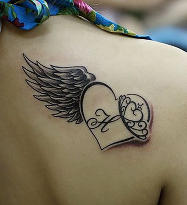 Black Outline Heart With Angel Wing Tattoo On Girl Back