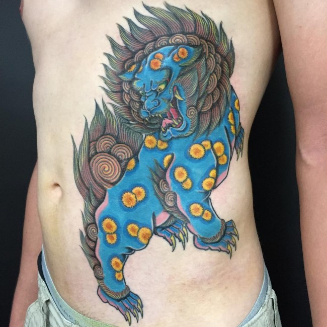Colorful Japanese Dog Lion Tattoo On Siderib