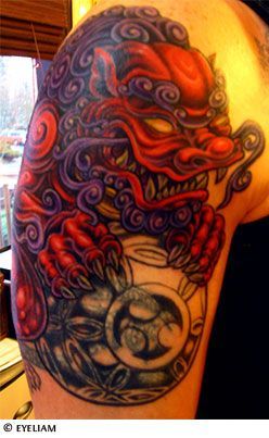 Dark Red Guardian Japanese Lion Tattoo On Half Sleeve