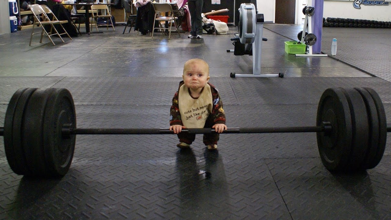Funny Kid Trying To Pull Weight