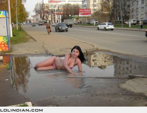 Funny Woman Posing For Photoshoot On Road