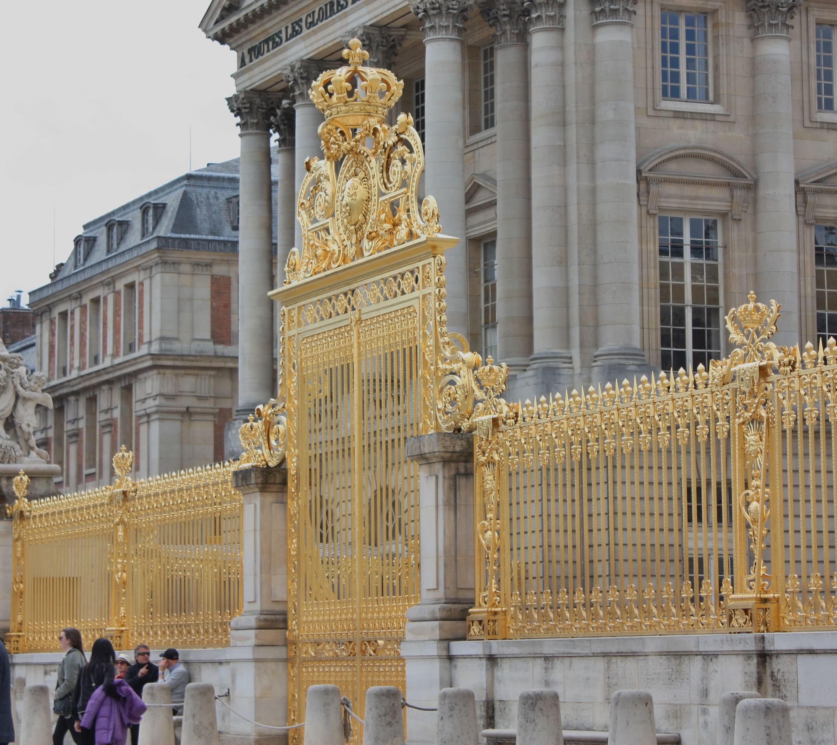 Golden Entrance Gate Of The Palace Of Versailles, France