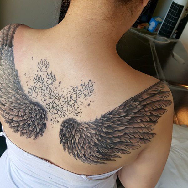 Grey Ink Realistic Angel Wings & Paws Tattoo on Girl’s Back