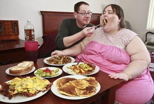 Husband Giving Food To Fat Wife Funny Picture