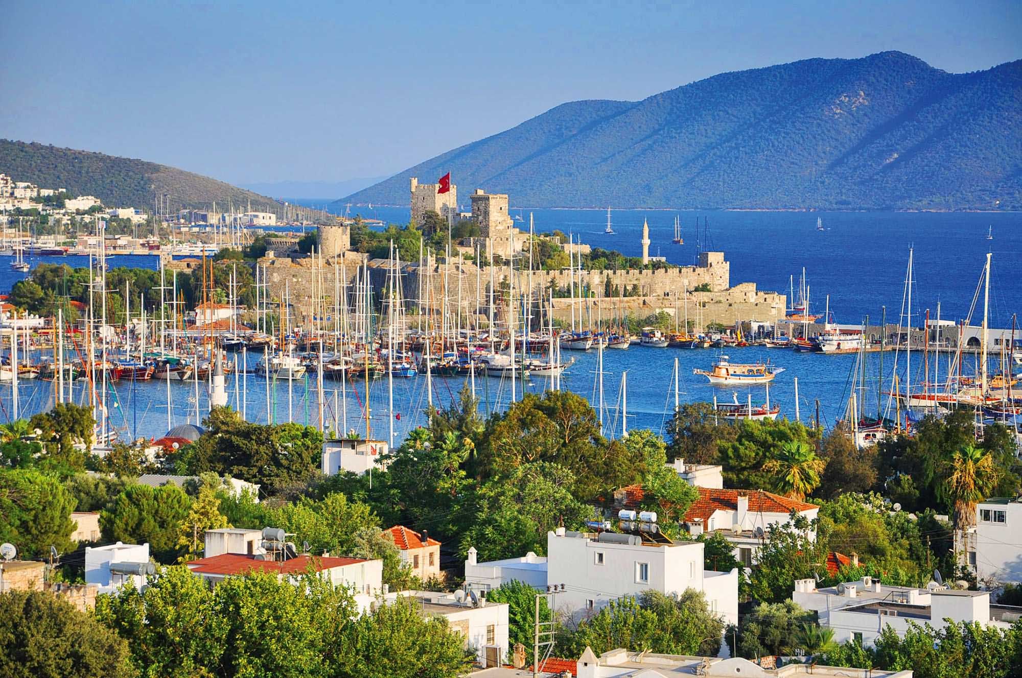 Incredible View Of Boats And Bodrum Castle With Mountains In Background