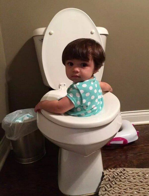 Kid Sitting In Toilet Funny Picture