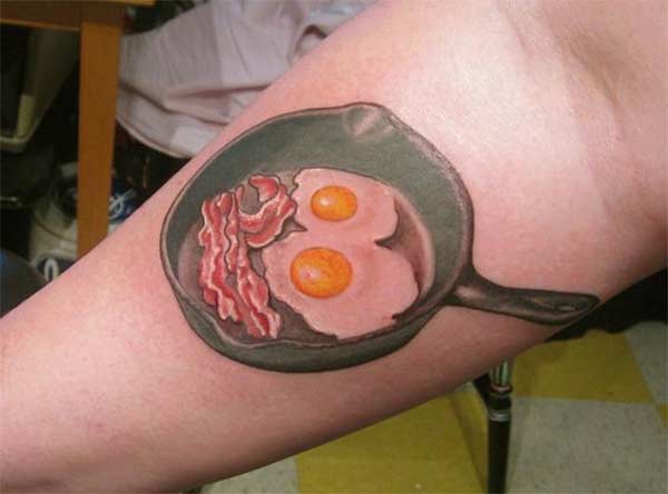 Omelete In Pan Funny Tattoo On Forearm