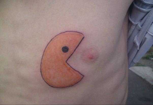 Pacman Funny Tattoo On Chest