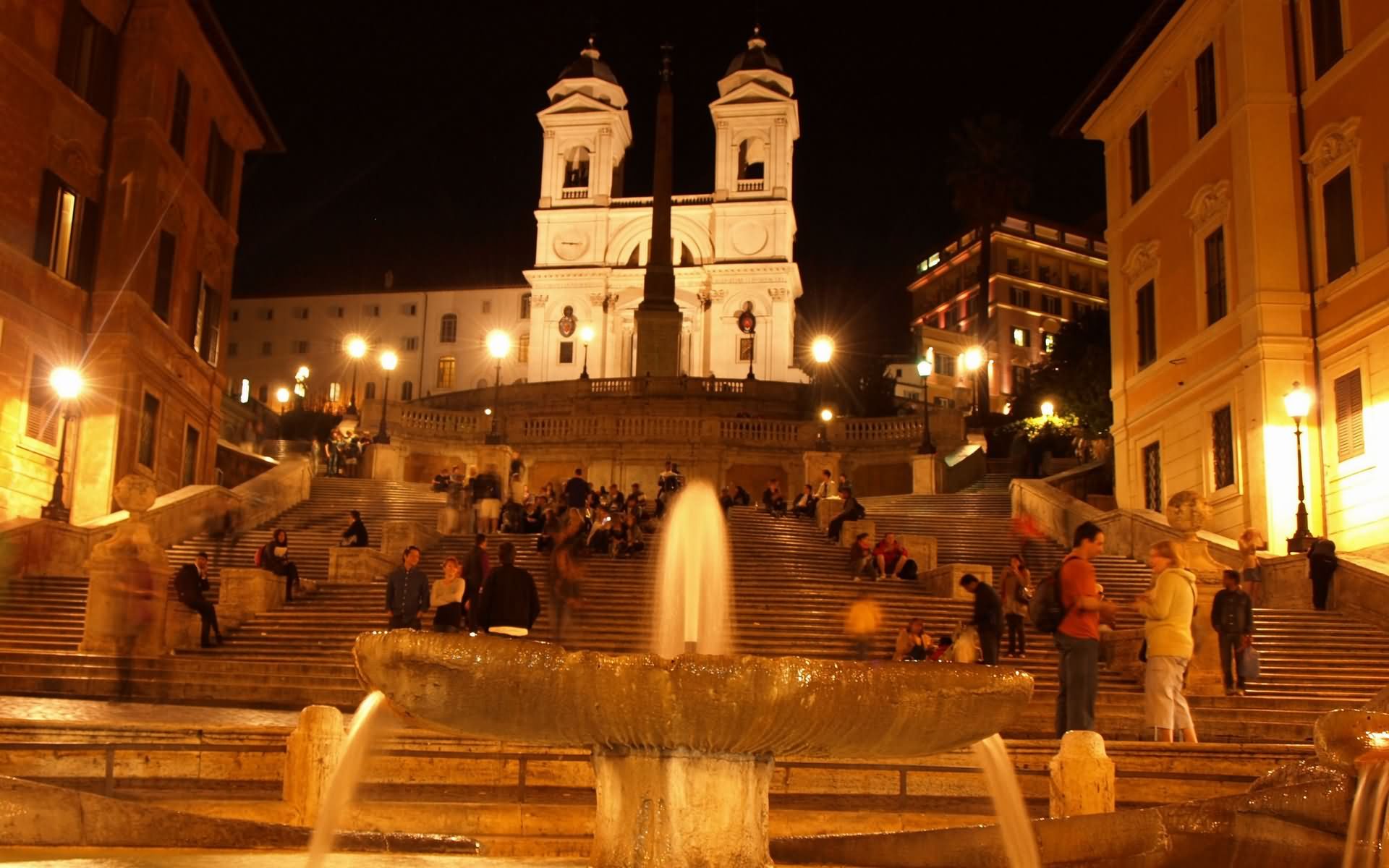 people enjoying the night view in front of Spanish steps