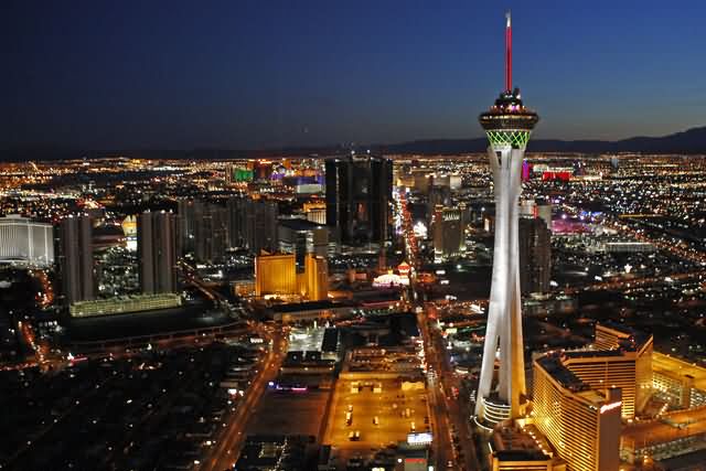 Stratosphere Tower And Las vegas City Lit Up At Night