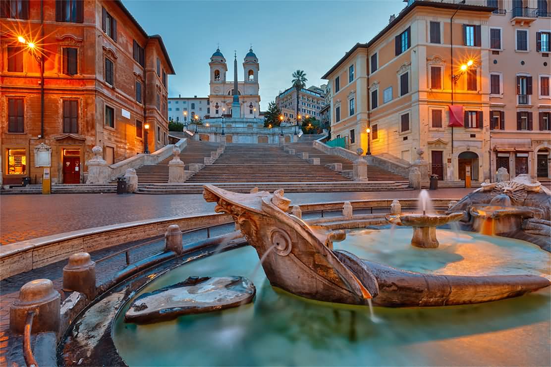 Water Fountain And Spanish Steps at Dusk