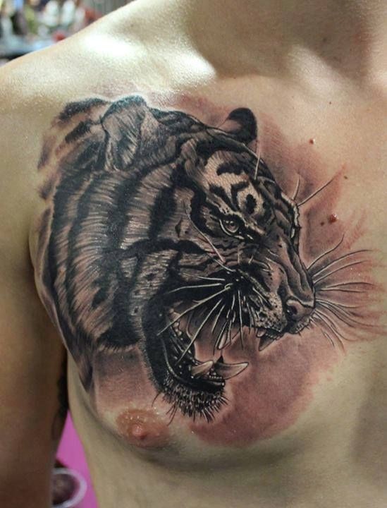 3D Black Ink Roaring Tiger Tattoo On Man Chest