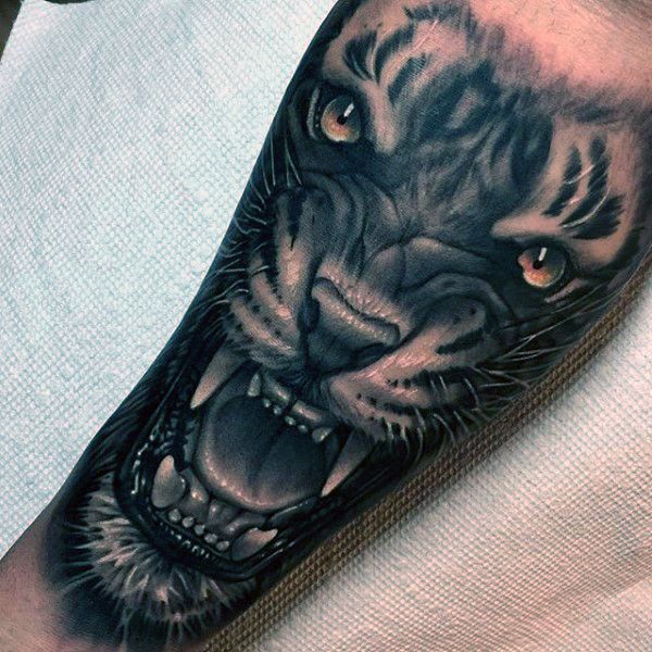 Amazing Dark Roaring Tiger Tattoo On Forearm