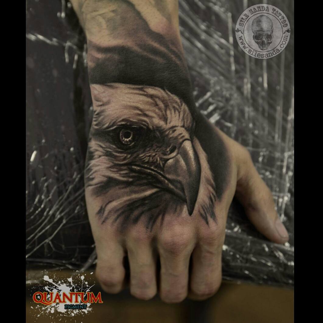 Amazing Grey Ink Dark Eagle Head Tattoo On Hand For Men