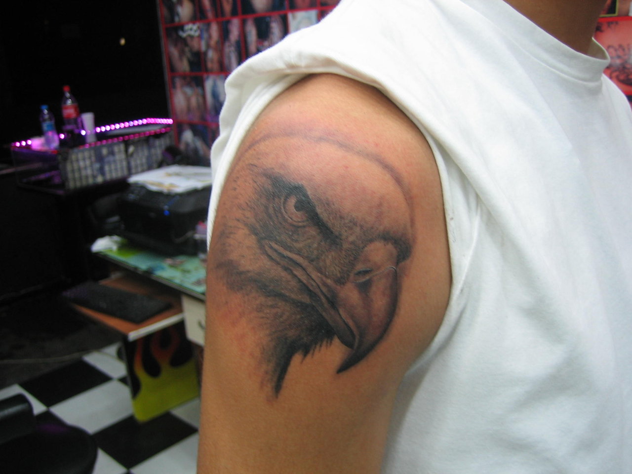 Amazing Grey Ink Realistic Eagle Head Tattoo On Shoulder