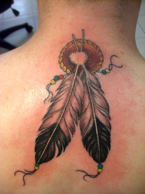 Amazing Traditional Eagle Feathers Tattoo On Upper Back