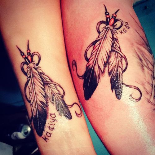 Awesome Eagle Feathers Tattoo Design With Names On Forearm For Couples