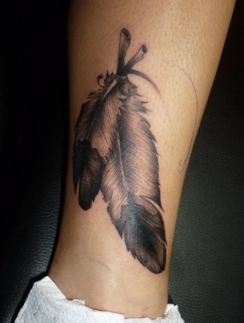 Beautiful Black & Grey Eagle Feathers Tattoo On Shin For Girls
