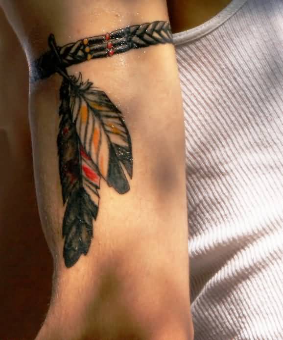 Black Eagle Feathers With Band Tattoo On Forearm