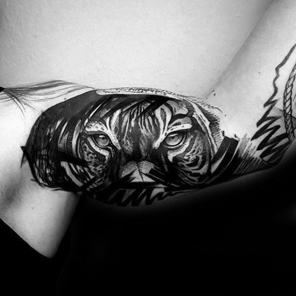 Black Ink Dark Tiger Eyes Tattoo On Bicep For Men